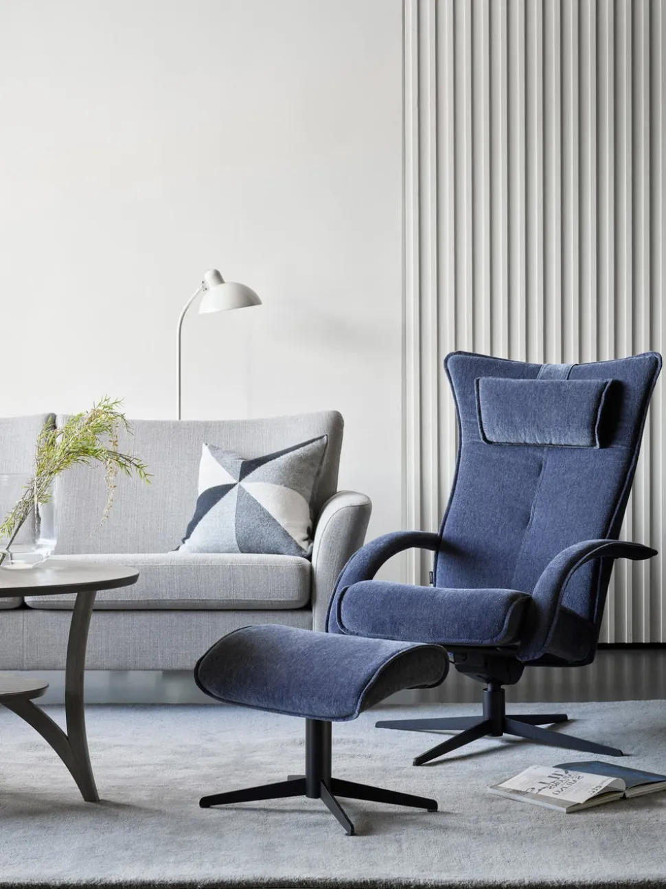 Delta Motion Fåtölj med Pall | Original | Fårskinn
