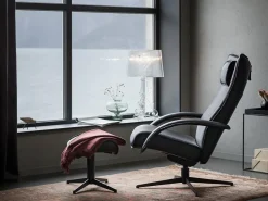 Delta Motion Fåtölj med Pall | Original | Fårskinn