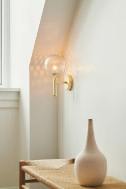 Miira Vägglampa | Brass/Optic Clear